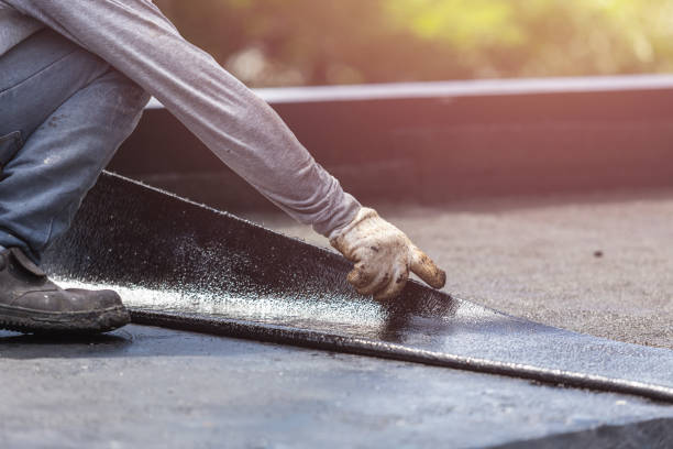 Professional Basement Waterproofing technician working in Pound, WI
